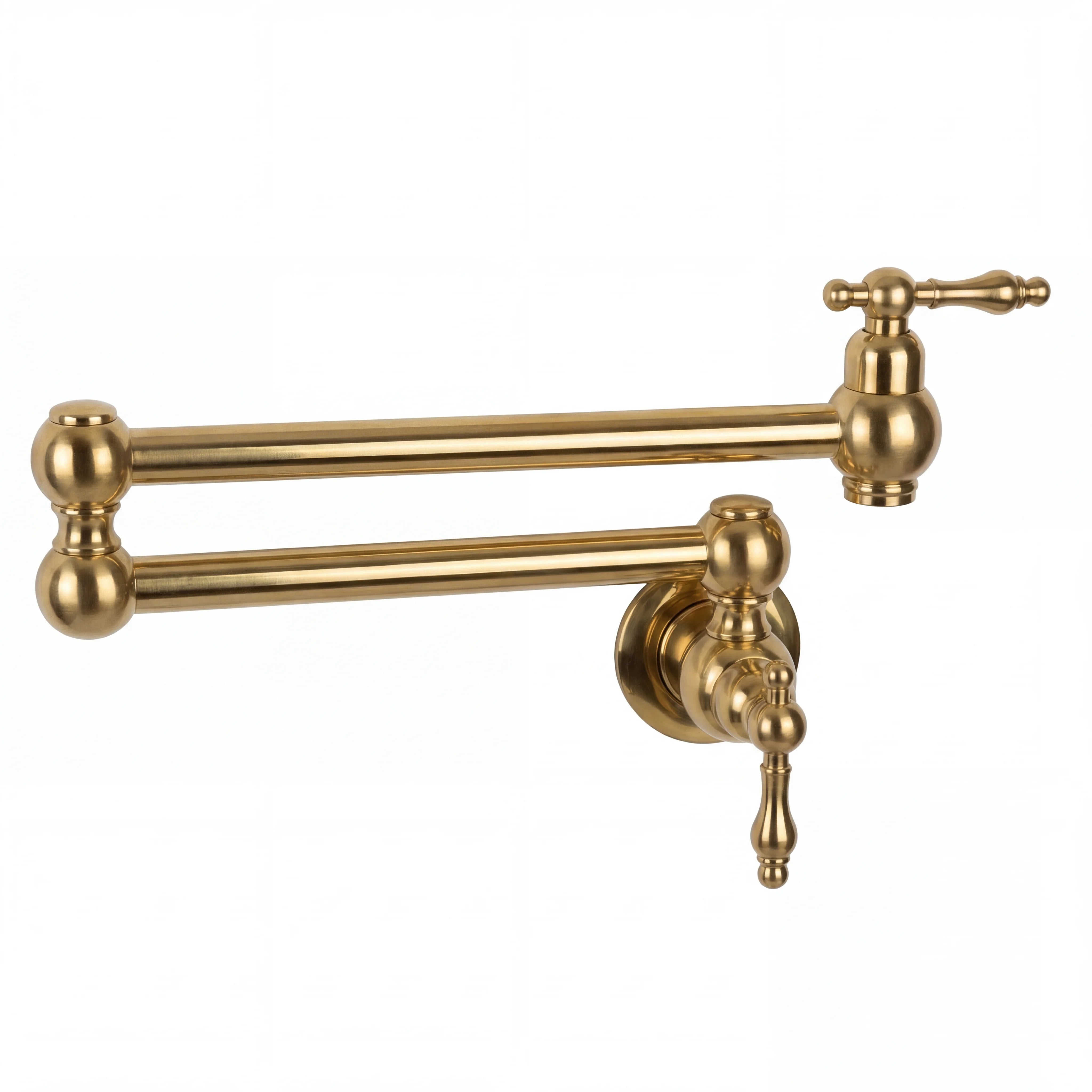 Gold wall-mounted faucet with two handles on a white background